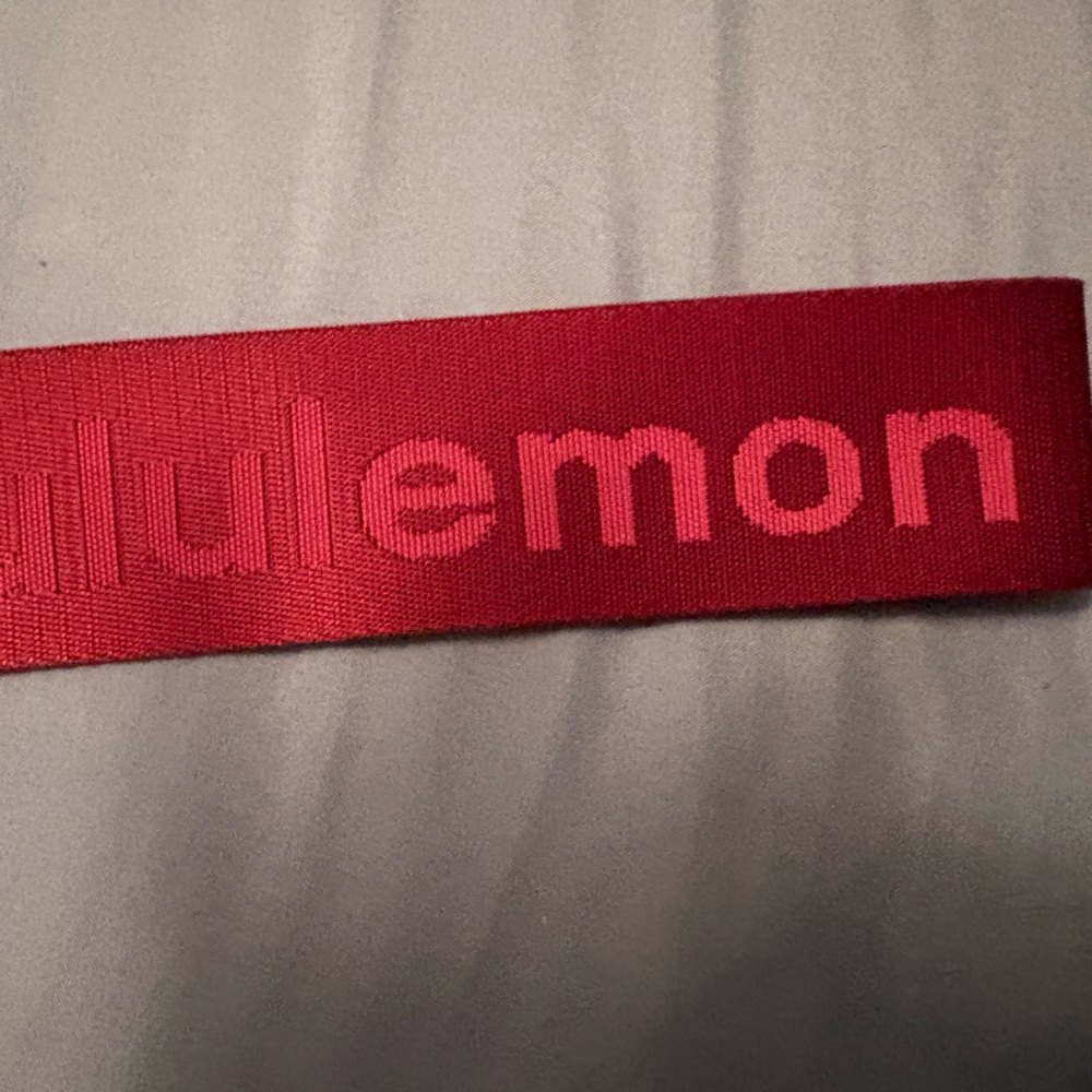 Lululemon Red Keychain- Burgundy color- This Keychain was Never Used-